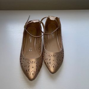 Charles Albert rose gold cut out flats